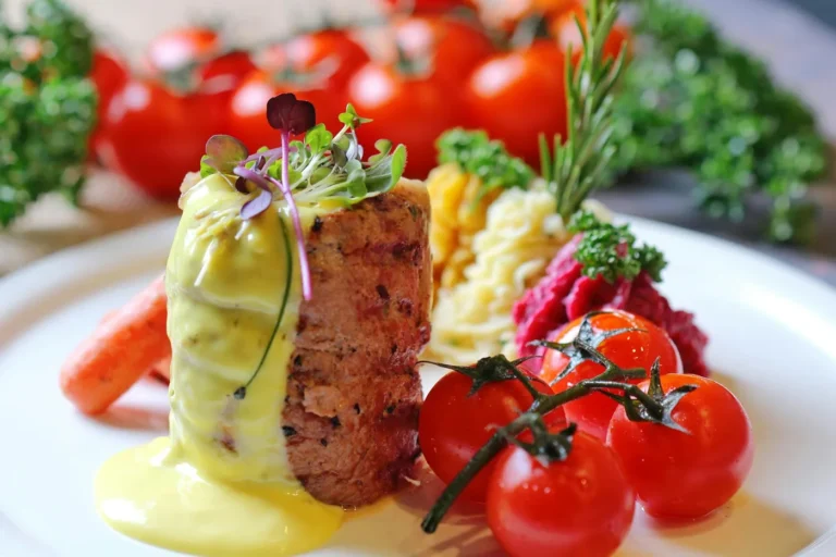A vibrant, beautifully plated seasonal restaurant dish featuring fresh, farm-to-table ingredients
