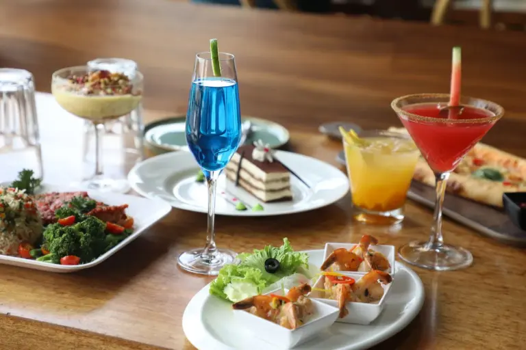 Best dessert menus at restaurants in America - A tempting dessert platter with cheesecake, chocolate cake, and tiramisu at an American resta