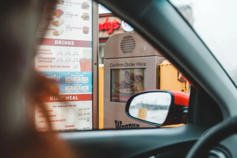 Best drive-thru breakfast menus in America - Collage of popular drive-thru breakfast items including sandwiches, burritos, and coffee from m