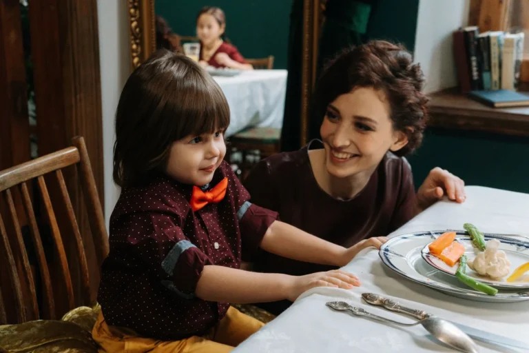 Best family meal deals at popular restaurants in America - A family enjoying a meal together at a casual restaurant table with various dishe