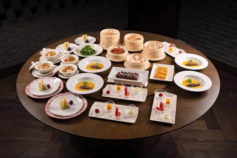 Dan Modern Chinese Reservations Restaurant Menu Guide in America - Dan Modern Chinese restaurant interior with dishes on table