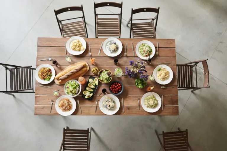 Italian Restaurant Menu Guide for Family Dinner in America - Italian family dinner with pasta, pizza, and tiramisu on a table