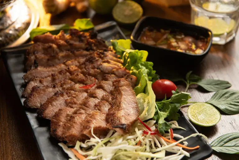 Best Thai restaurant menu picks in America - Thai food spread including pad thai, green curry, spring rolls